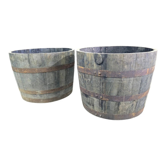 Large oak reclaimed whisky barrel planter pot pair by Garden Crafty Barrel; rustic weathered wood with metal bands.